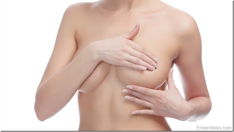 Cropped image of a female controlling breast for cancer, isolated on white background; Shutterstock ID 117075934; PO: aol; Job: production; Client: drone